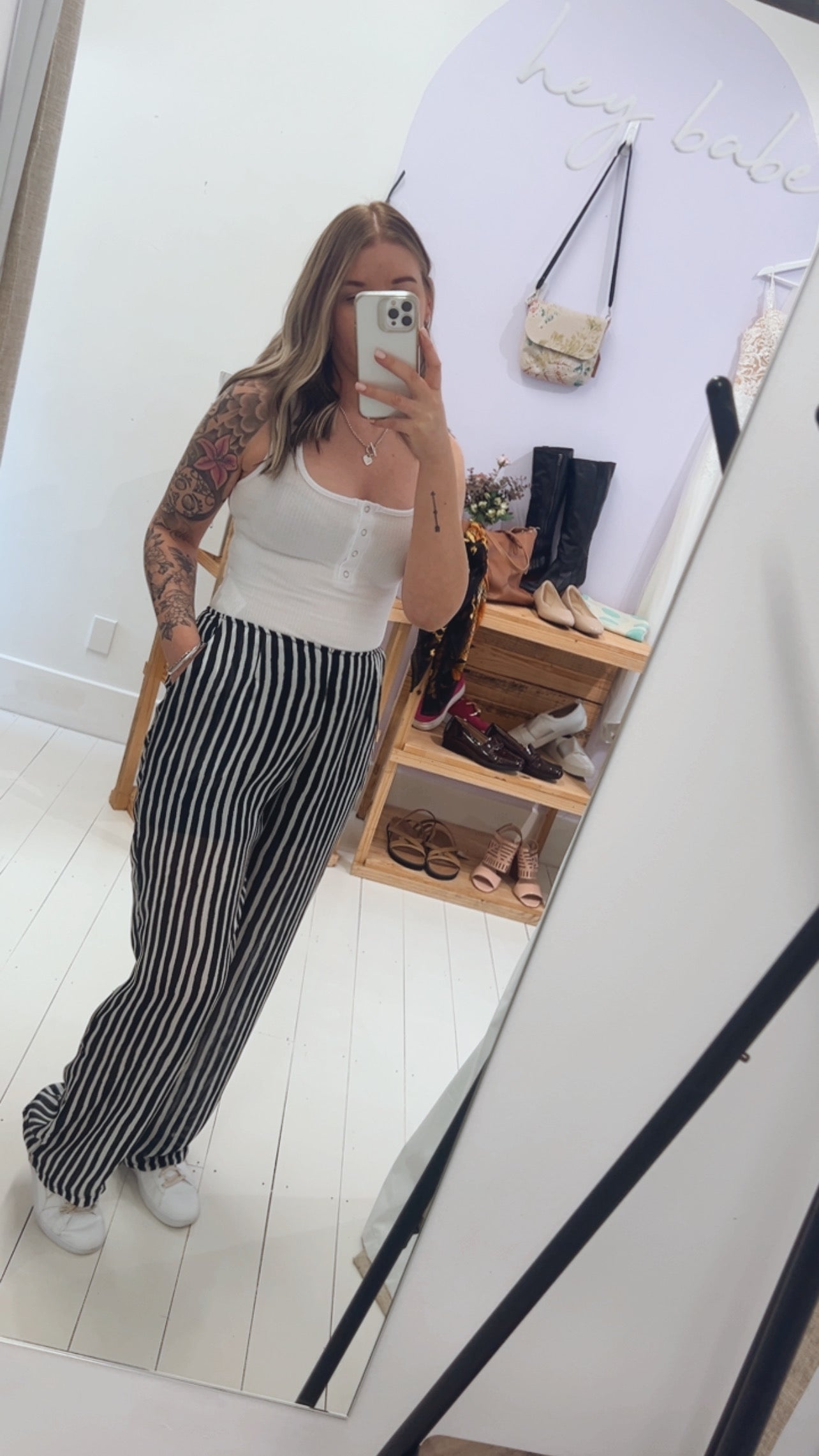 Some kind black and white striped dress pants 12