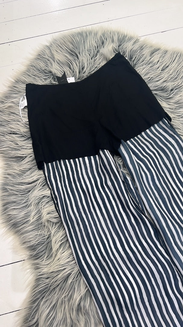 Some kind black and white striped dress pants 12