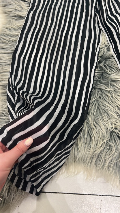 Some kind black and white striped dress pants 12