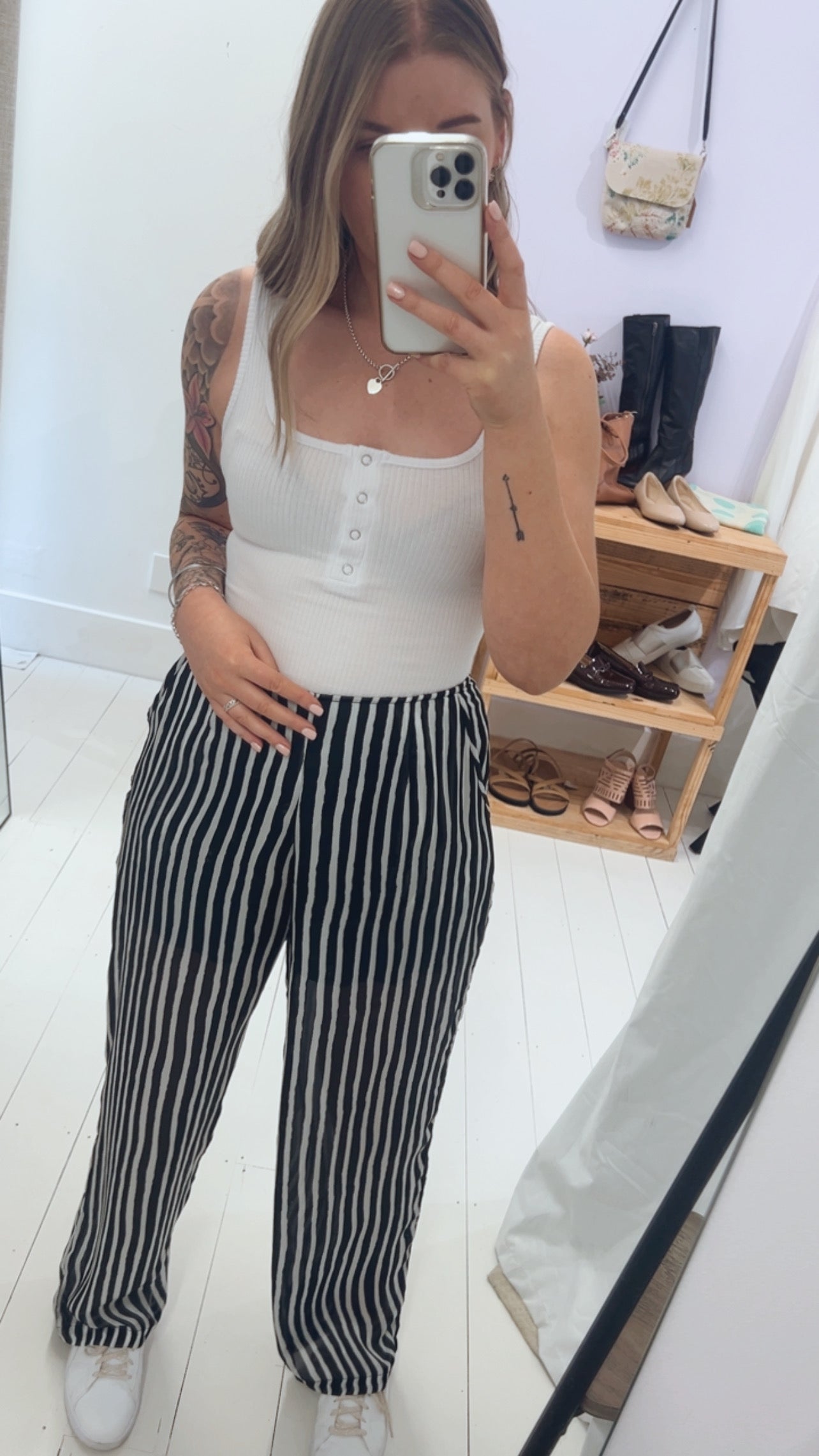 Some kind black and white striped dress pants 12